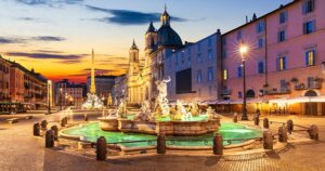 Famous Piazza Navona at sunset with the Fountain of Neptune, Rome, Italy.